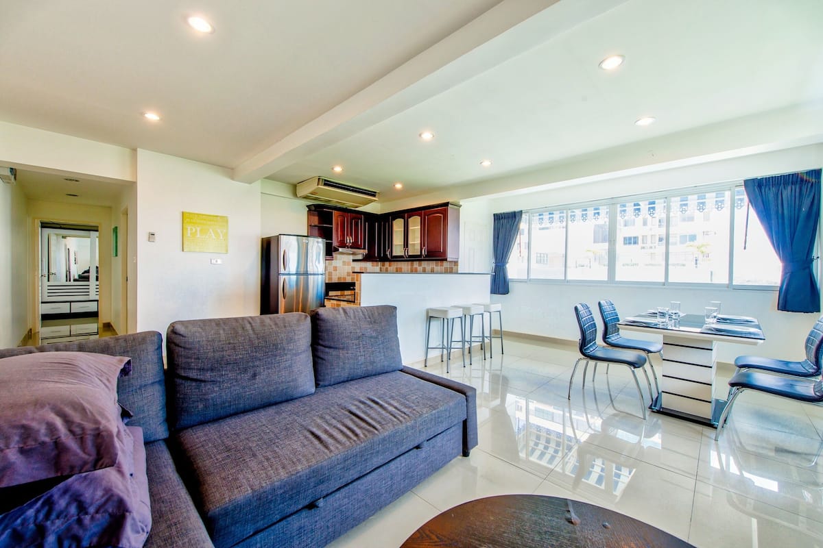 2-Bedroom Condo | Living area | Flat-screen TV