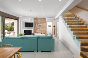 Villa, 3 Bedrooms, Private Pool | Living area | 40-inch flat-screen TV with satellite channels, TV, fireplace