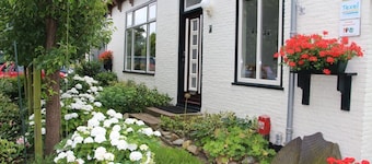 Stylish apartment with garden in a former farmhouse in De Waal
