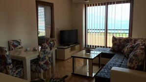 Apartment, Sea View (Stella) | Living area | Flat-screen TV - Apartments Bella (Bijela)