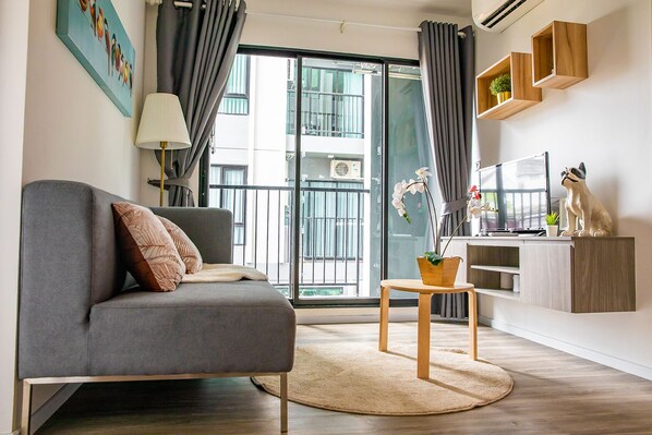 Comfort Apartment, 2 Bedrooms | Living area | LED TV - Apartment 450m from BTS with Sky Pool - bkbloft1 (Samut Prakan)