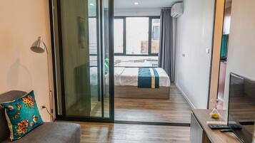 Comfort Apartment, 1 Bedroom | Living area | LED TV