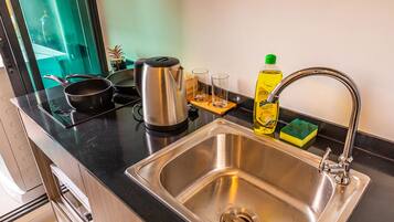 Comfort Apartment, 1 Bedroom | Private kitchenette | Full-size fridge, microwave, stovetop, electric kettle