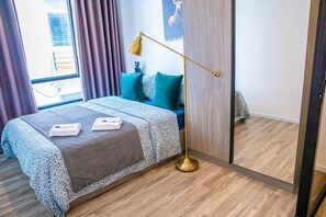Comfort-huoneisto, 1 makuuhuone | 1 makuuhuone, pimennysverhot, ilmainen Wi-Fi, vuodevaatteet