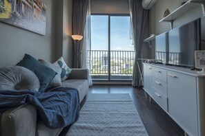 Comfort Apartment, 1 Bedroom | Living area | LED TV