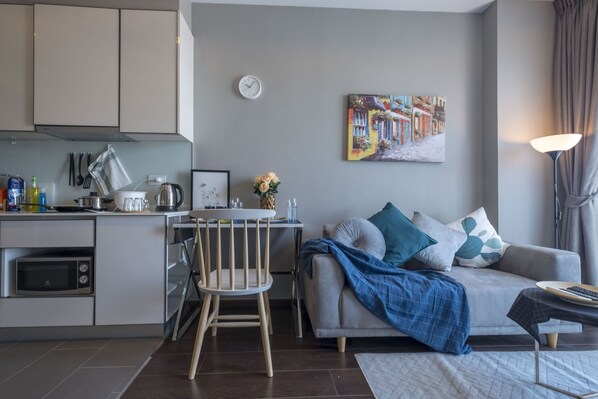 Comfort Apartment, 1 Bedroom | Living area | LED TV