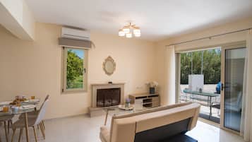 Apartment, 1 Bedroom | Living area | Flat-screen TV