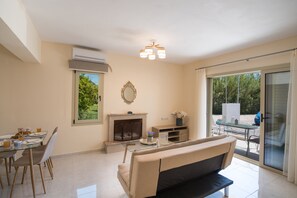 Apartment, 1 Bedroom | Living area | Flat-screen TV - Bounatsa Studios & Apartments (Lefkada)