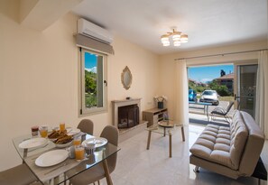 Apartment, 1 Bedroom | Living area | Flat-screen TV - Bounatsa Studios & Apartments (Lefkada)