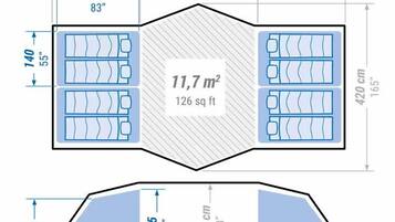 A floor plan of a hotel room with dimensions 740 cm (291 inches) by 420 cm (165 inches), featuring two beds and a bathroom.