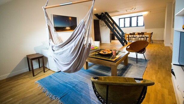 Apartment (2 Bedrooms) | Living room | 40-inch TV with cable channels - Charming Triplex Near Avenue Louise (Brussels)