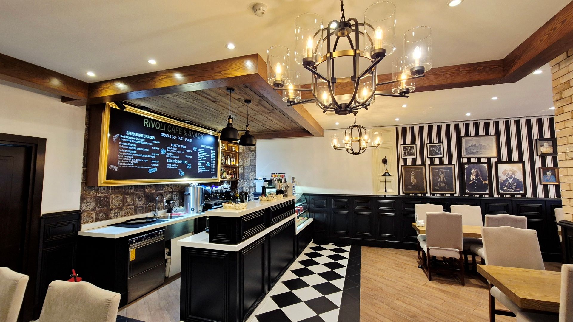 A restaurant interior with a bar, seating area, and a menu board.
