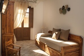 Chambre Junior | Coin séjour | Télévision à écran plat