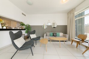 Deluxe Apartment, 2 Bedrooms | Living area | TV - Maison Privee - Central Dubai Apt w/Danish Twist & Burj Khalifa Vws (Dubai)