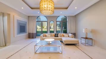 Deluxe Villa, 6 Bedrooms | Living area | Flat-screen TV