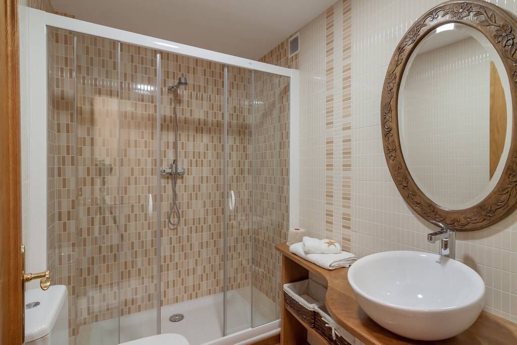 Bathtub, hair dryer, towels, soap