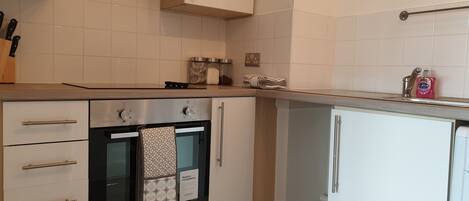 Fridge, oven, electric kettle, toaster