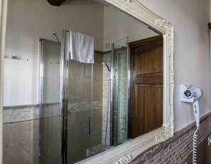 Hair dryer, towels, soap, toilet paper