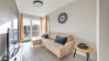 Apartamento (1A) | Área de estar | TV