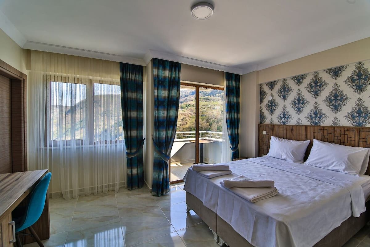 family room | in-room safe, desk, laptop workspace, free wifi