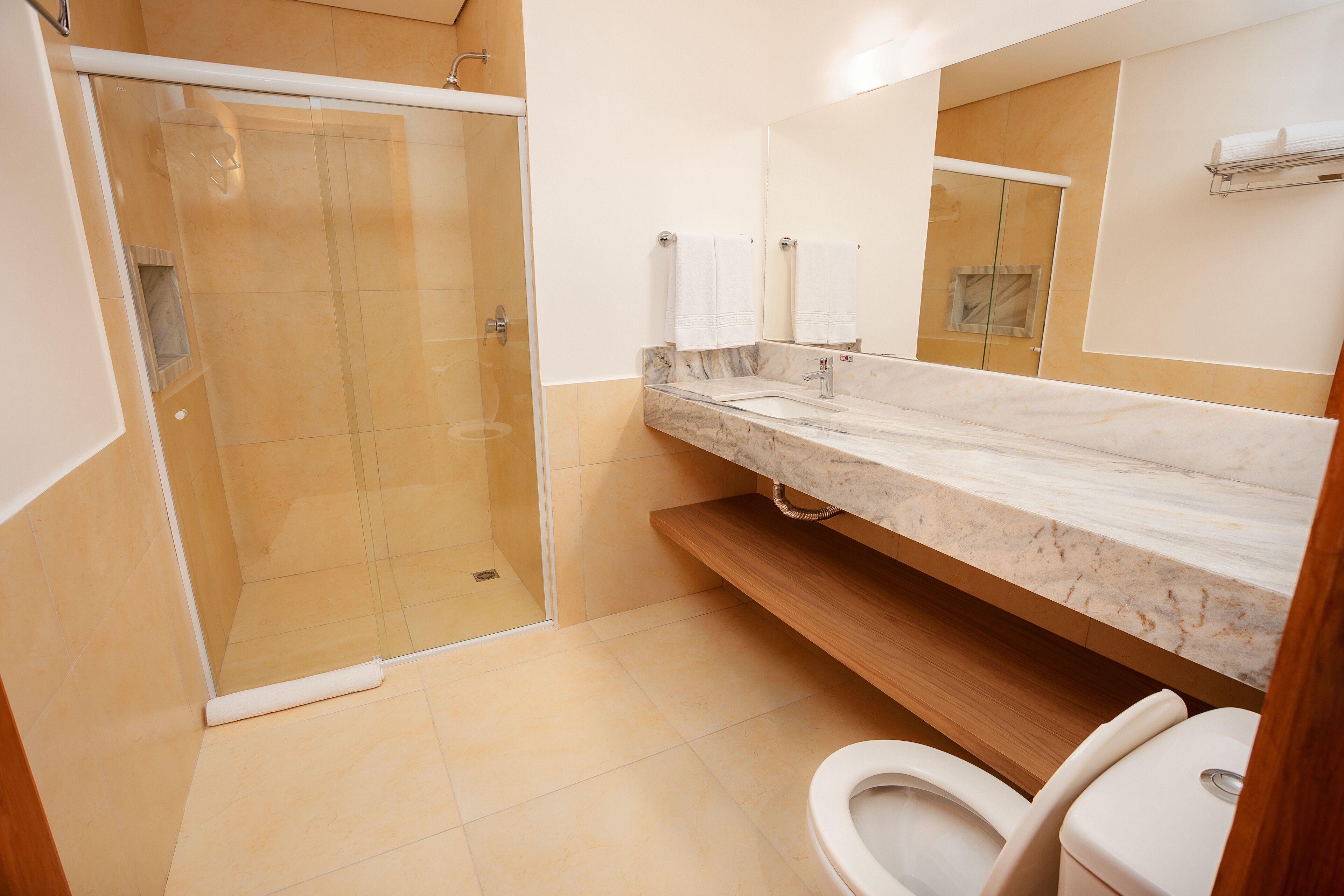superior double room | bathroom | shower, free toiletries, hair dryer, towels