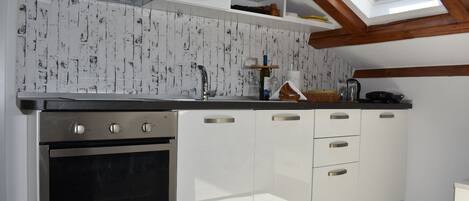 Apartment | Private kitchen | Full-size fridge, oven, stovetop, dishwasher