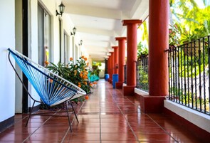 Standard Double Room | Living area | 35-inch LED TV with cable channels