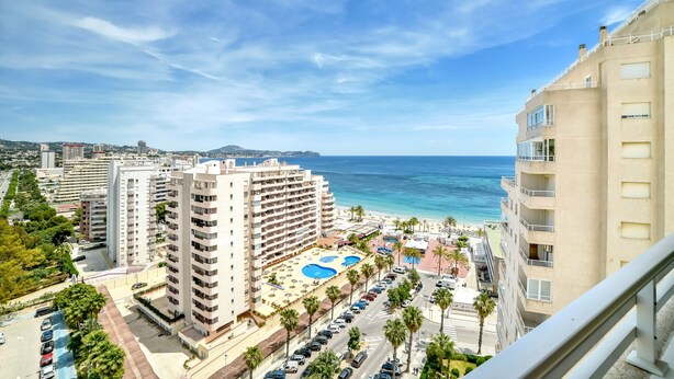A high-rise hotel with a pool area, beachfront view, and parking lot. - Apolo XVII 1-14-41, La Fossa -Salinas (Calpe)