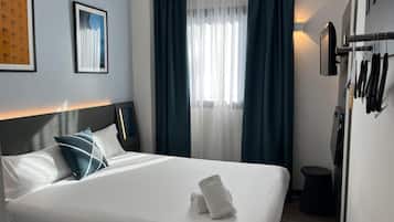 Desk, blackout curtains, soundproofing, iron/ironing board