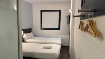 Desk, blackout drapes, soundproofing, iron/ironing board