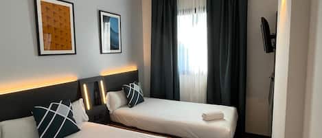 Desk, blackout curtains, soundproofing, iron/ironing board