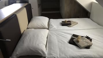 2 bedrooms, in-room safe, iron/ironing board, travel cot