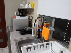Fridge, microwave, coffee/tea maker, blender