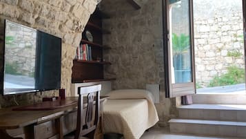 Family Room | Premium bedding, individually decorated, individually furnished, desk