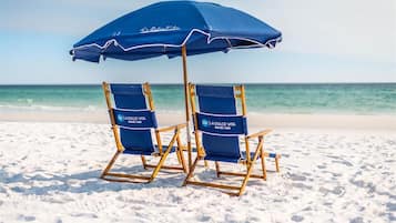 On the beach, sun-loungers