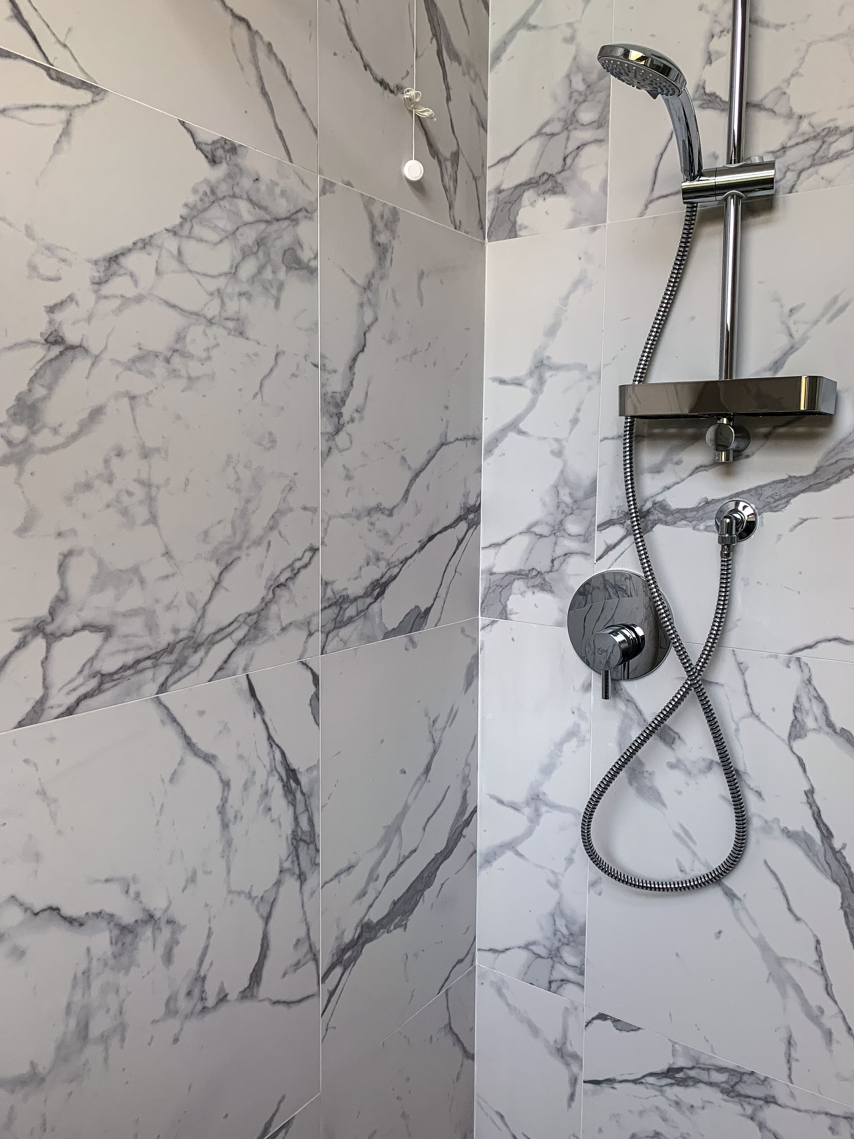 Shower, eco-friendly toiletries, hair dryer, bidet