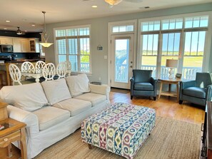 Living area - 5 bed, 5.5 bath Canal House with dock. Just a short walk to beach! (Supply)