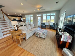 Living area - 5 bed, 5.5 bath Canal House with dock. Just a short walk to beach! (Supply)