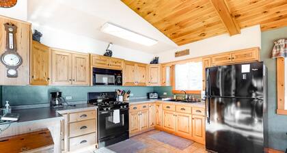 Spacious lakefront home with pier views, canoe, and fire pit - family-friendly