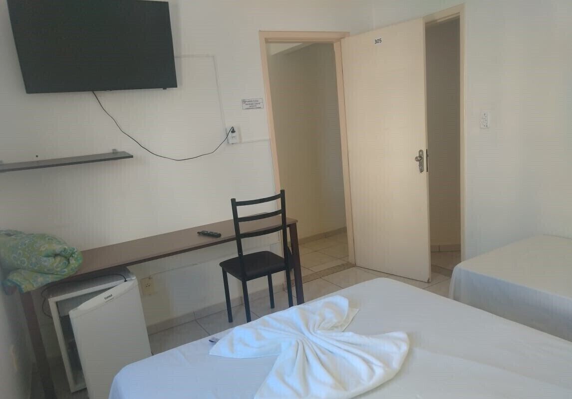 Triple Room (Frigobar) | Iron/ironing board, free WiFi