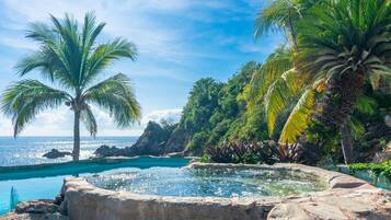 Outdoor pool, pool umbrellas, sun loungers