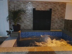 Outdoor pool, open 10:00 AM to 8:00 PM, free pool cabanas
