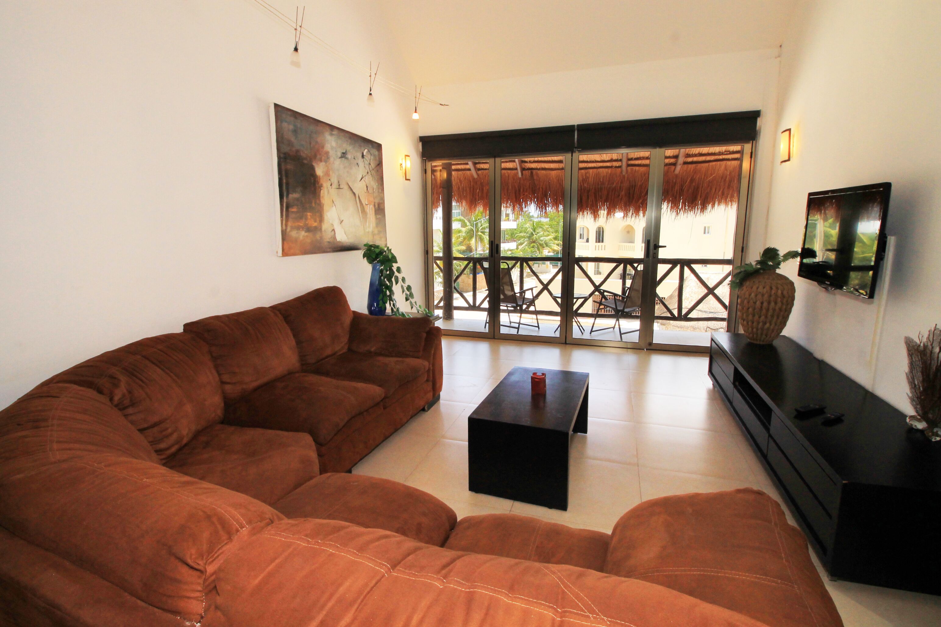 Apartamento superluxo, 3 quartos | Área de estar | TV de tela plana 40 polegadas com canais a cabo, TV