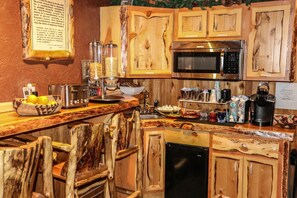 Mini-fridge, microwave, coffee/tea maker, high chair