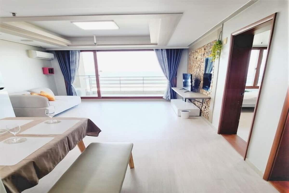 Family Room, Ocean View (30PY) | Desk, laptop workspace, soundproofing, free WiFi