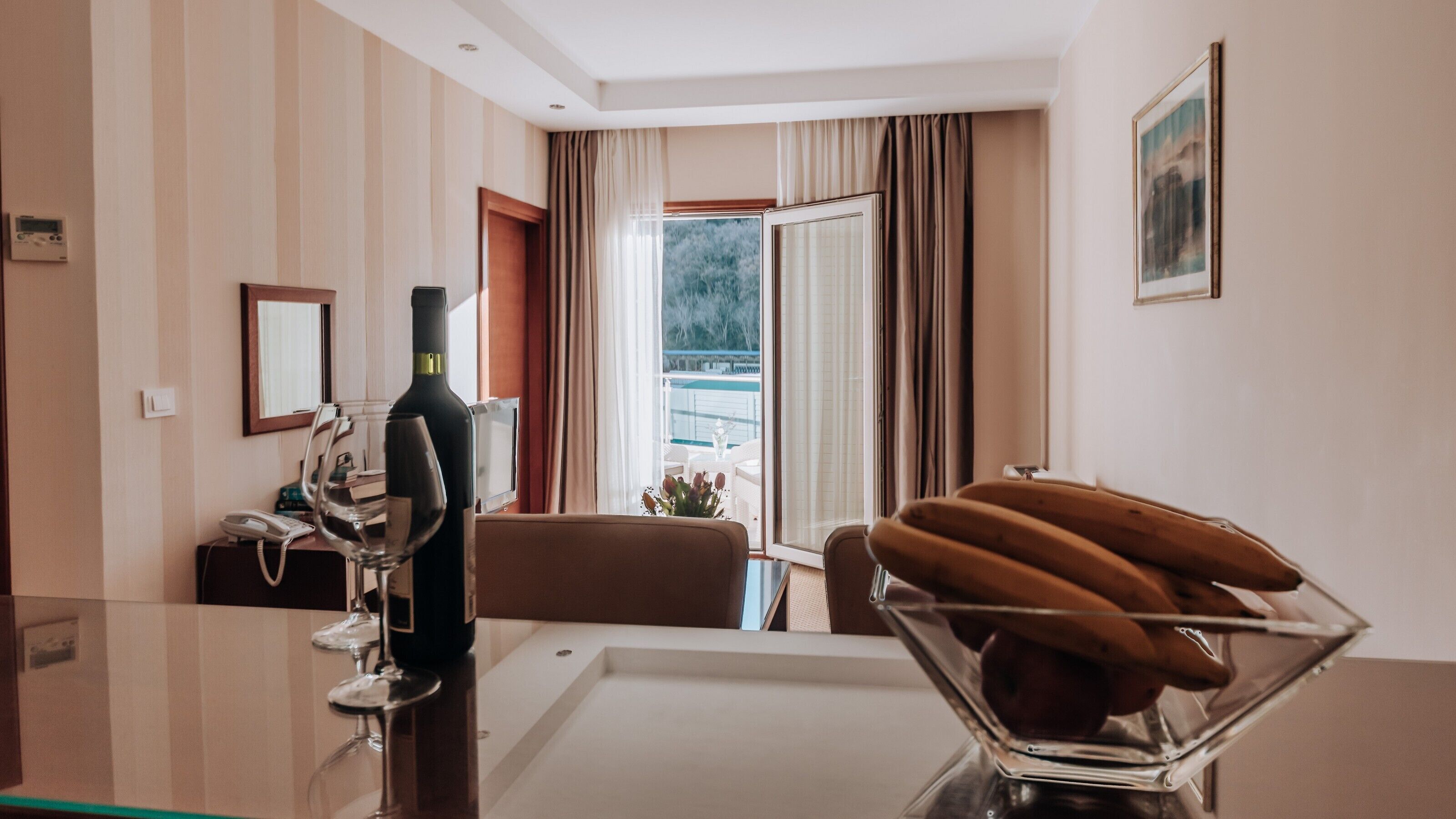 Standard Apartment | Living area | 32-inch LCD TV with cable channels, TV