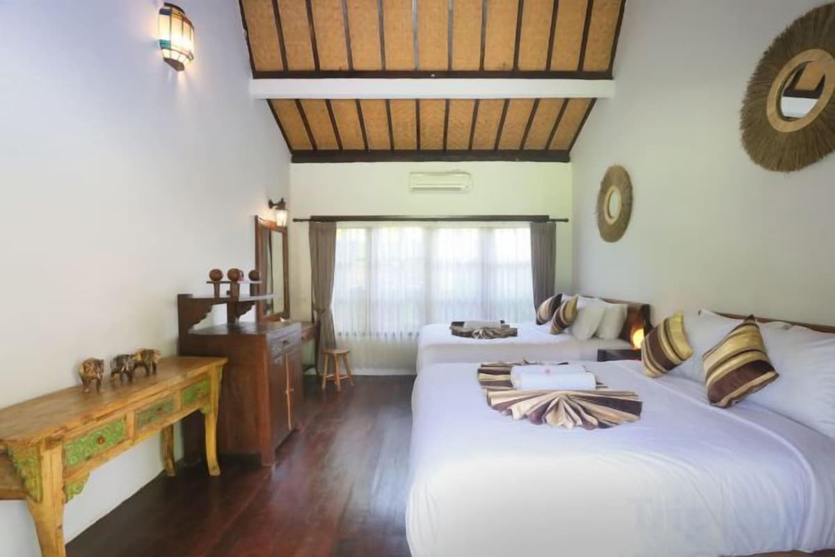 Ropa de cama de alta calidad, minibar, cortinas opacas