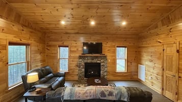 Cabin, 2 Bedrooms | Living area | TV, fireplace