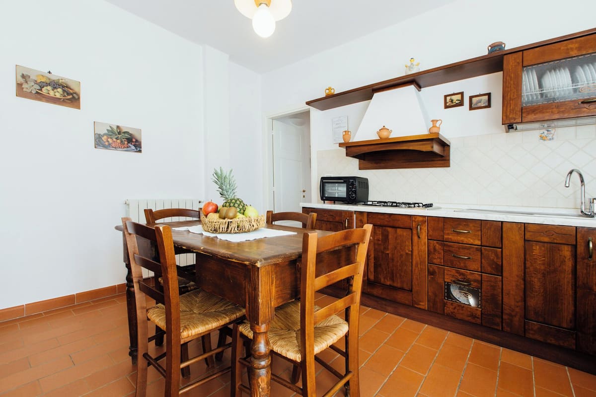 Classic Condo, Patio, Garden View | Living area | Flat-screen TV