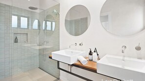 Shower, hair dryer, towels